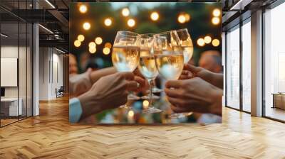 People cheers, making toasts with wine and champagne glasses at a party celebration with friends enjoy a warm summer evening Wall mural