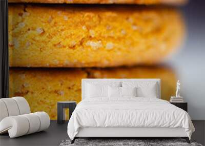 A stack of yellow cookies with a white background Wall mural