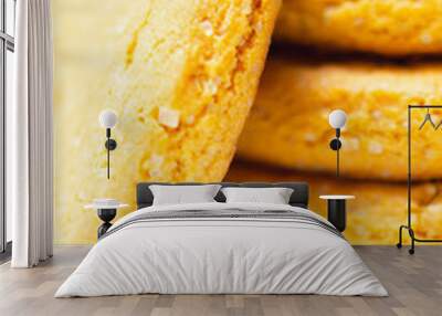 A stack of yellow cookies with a white background Wall mural