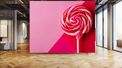 Candy lolypop on pink and red background Wall mural