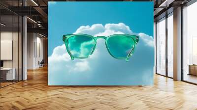 On a silver cotton cloud against a blue backdrop green spectacles Wall mural