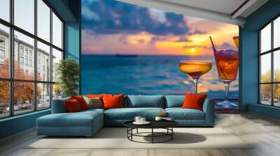 Summertime cocktails served in two chic glasses at a five star beach resort at dusk Wall mural