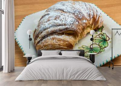 Croissant in colored dish Wall mural