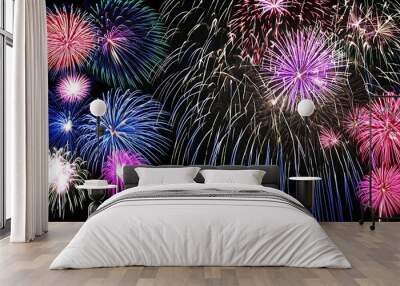 Colorful trails and night sky glory of fireworks feast Wall mural