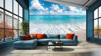 Pristine beach with crystal clear turquoise waters and fluffy white clouds in a bright blue sky Wall mural