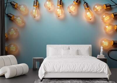 Illuminated Light Bulbs Arrangement on Blue Background Perfect for Innovation Concepts and Creative Ideas Wall mural