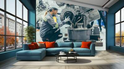 engineer robotic mechanic women technician working in advance robotic industry plant work assembly r Wall mural