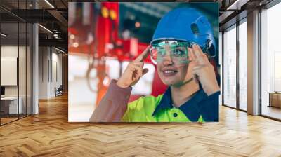 Engineer women using visual VR glasses innovation in advance engineering technology industry working support device Wall mural