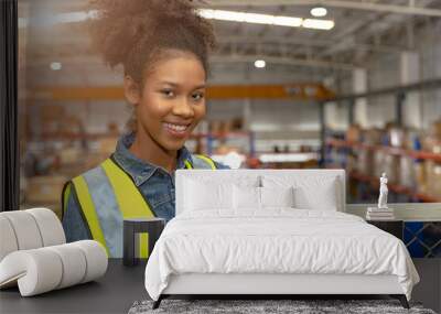 portrait young teen African black girl teen work in large warehouse factory stock happy smiling. Wall mural