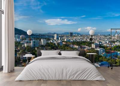 Panoramic view of Vung Tau sea from above with waves, coastline, streets, coconut trees and Tao Phung mountain in Vietnam. Travel concept Wall mural