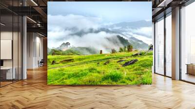 Panoramic view of sunrise with a trail going through a valley filled with white clouds in the Tak Po mountains in Tra Tap commune, Nam Tra My district, Quang Nam province, Vietnam Wall mural