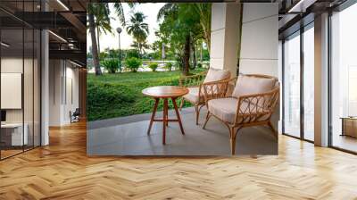 two bamboo and rattan chairs to relax at Pax Ana 4-star resort in Doc Let beach, city Nha Trang street, VN Wall mural