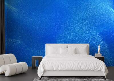 Dense field of blue particles, creating a dynamic and textured background suitable for high-tech graphics and designs. 3D render Wall mural