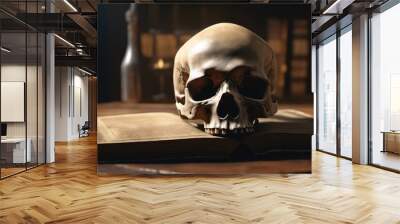 Explore the macabre: skull on aged book in a library. Great for horror literature and occult-themed publications, captivating readers with a sense of dread.. Wall mural