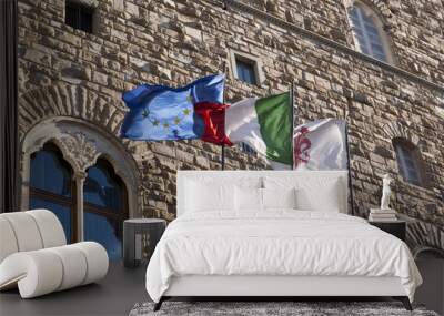 Flags on Palazzo Vecchio in Florence Tuscany Italy Wall mural