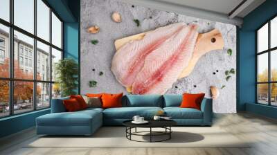 Top view of fresh fillet dory fish on wooden tray Wall mural