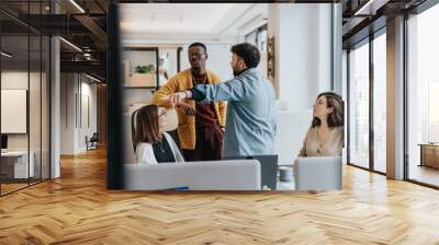 A diverse group of colleagues discussing reports, analyzing statistics, and strategizing as a corporate team for project development and profit growth. Wall mural