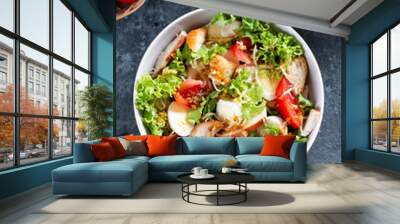 Classic caesar salad with chicken fillet and parmesan cheese. Chicken Caesar Salad. Top view, copy space. Wall mural