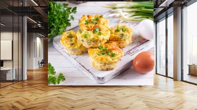 Fresh baked egg bites on a wooden board Wall mural