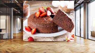 Homemade round chocolate sponge cake or chiffon cake with strawberry. Homemade bakery concept for background and wallpaper Wall mural