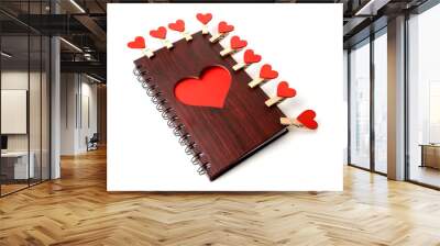 Notepad c wooden texture with red heart and clothespins on a white background Wall mural