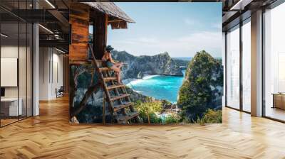 Traveler on Tree House at Diamond Beach, Nusa Penida Island, Bali, Indonesia Wall mural