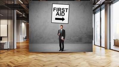 business person holding a traffic sign Wall mural