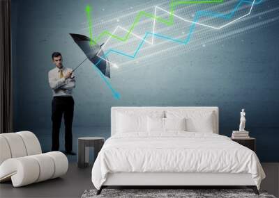 Business person with umbrella and stock market arrows concept Wall mural