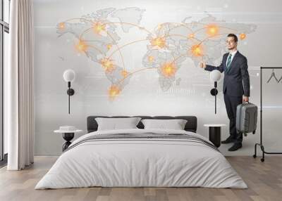 Businessman in dark suit hitchhike to business trip in a front of a map with destination Wall mural