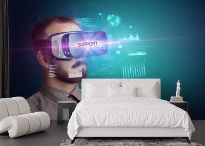 Businessman looking through Virtual Reality glasses Wall mural