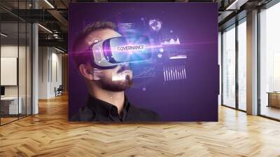 Businessman looking through Virtual Reality glasses Wall mural