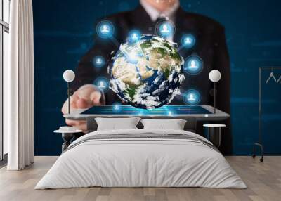 Businessman presenting 3d earth globe in tablet Wall mural