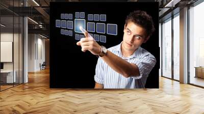 Businessman pressing high tech type of modern buttons Wall mural