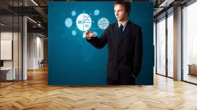 Businessman pressing modern business type of buttons Wall mural