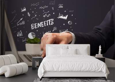 Businessman working on laptop with BENEFITS inscription, modern business concept Wall mural