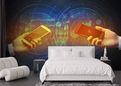 Close up of two smartphones syncing business data Wall mural