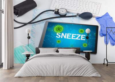 Close-up view of a tablet pc with SNEEZE inscription, microbiology concept Wall mural