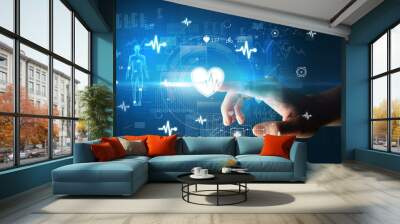 Doctor hand pressing futuristic health device with medical symbol on screen Wall mural