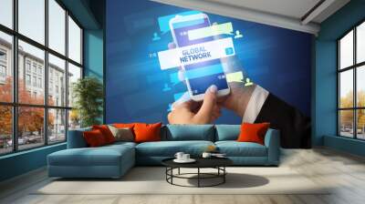 Female hand typing on smartphone with GLOBAL NETWORK inscription, social networking concept Wall mural