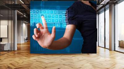 Girl pressing virtual type of keyboard Wall mural