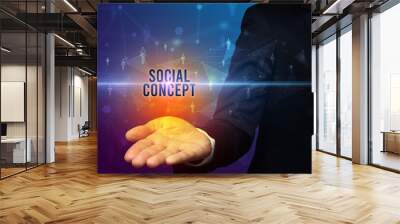 Hand holding social media related inscription Wall mural