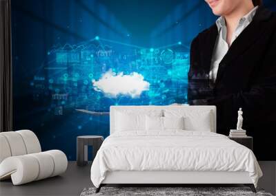 Hand holding tablet with cloud technology and dark concept
 Wall mural