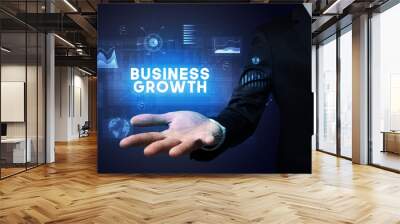 Hand of Businessman holding motivational message Wall mural