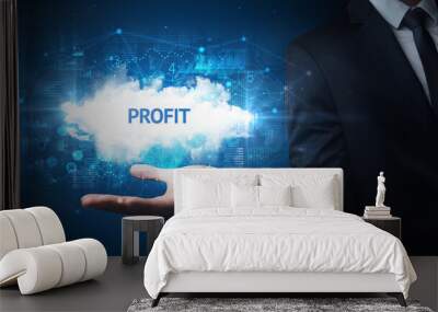 Hand of Businessman holding PROFIT inscription, successful business concept Wall mural