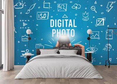 Hand taking picture with digital camera and DIGITAL PHOTO inscription, camera settings concept Wall mural