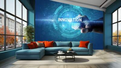 Hand touching INNOVATION button, modern business technology concept Wall mural