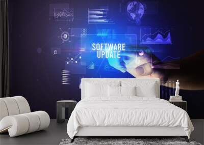 Hand touching SOFTWARE UPDATE inscription, new business technology concept Wall mural