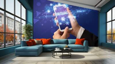 Hand using smartphone with technology concept Wall mural