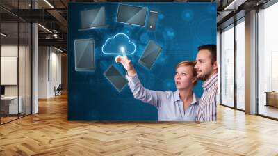 Happy couple touching cloud service Wall mural