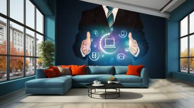 holding digital media icons Wall mural